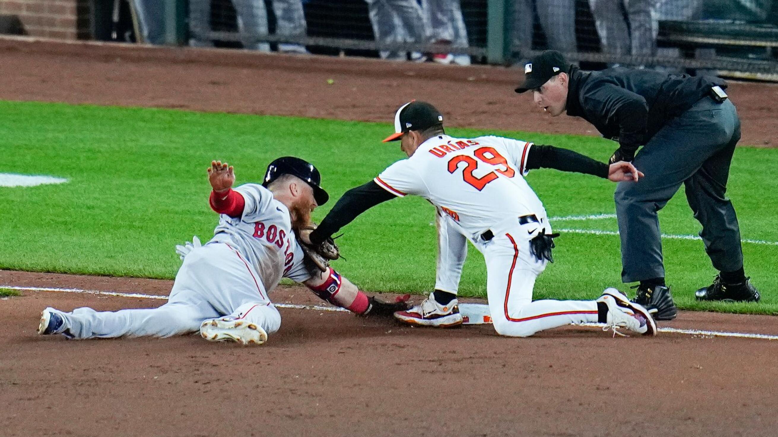Orioles rally to from 4-0 deficit and top Sox 5-4 for 7th straight