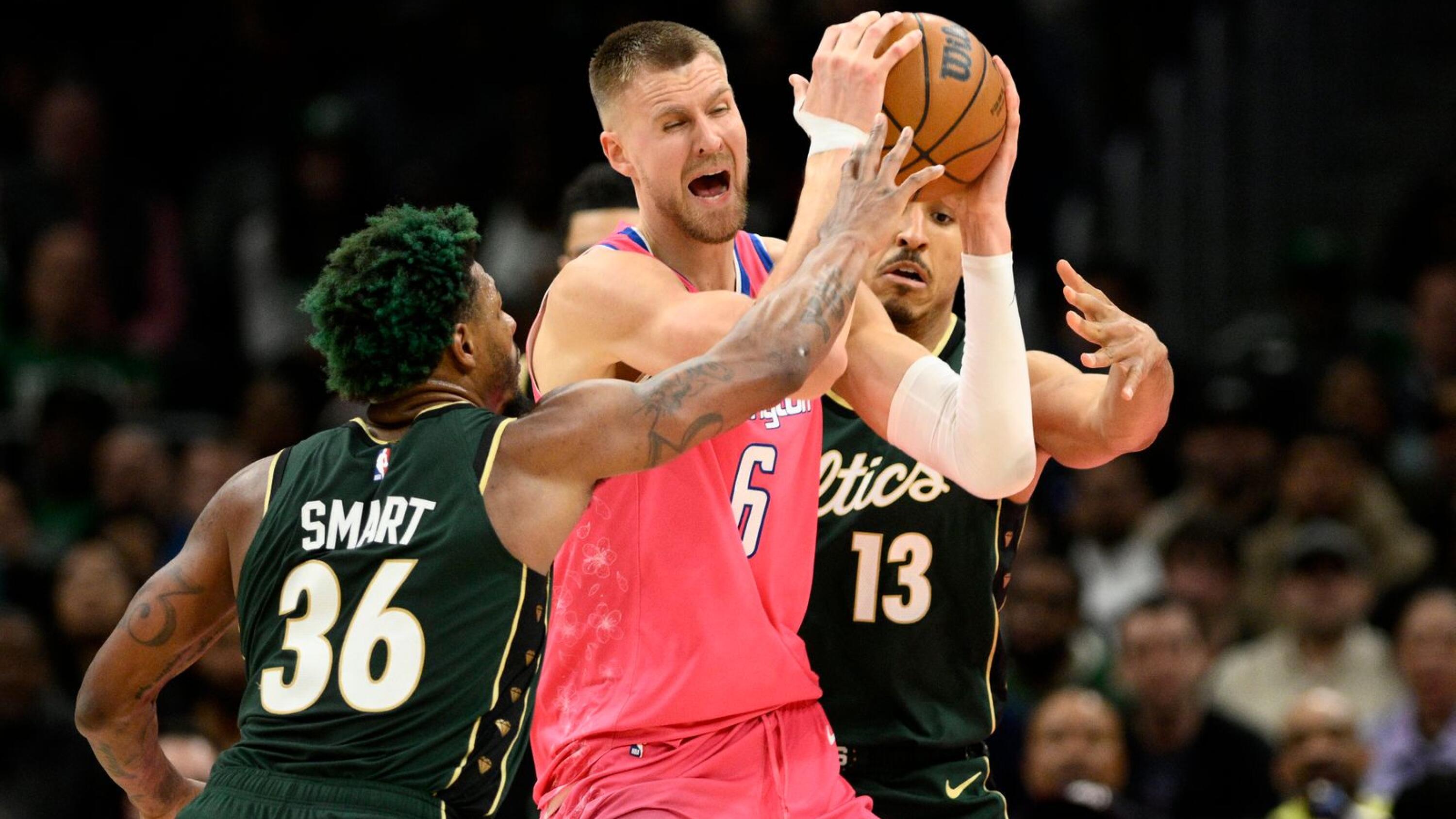 Short-handed Wizards rout Celtics 130-111