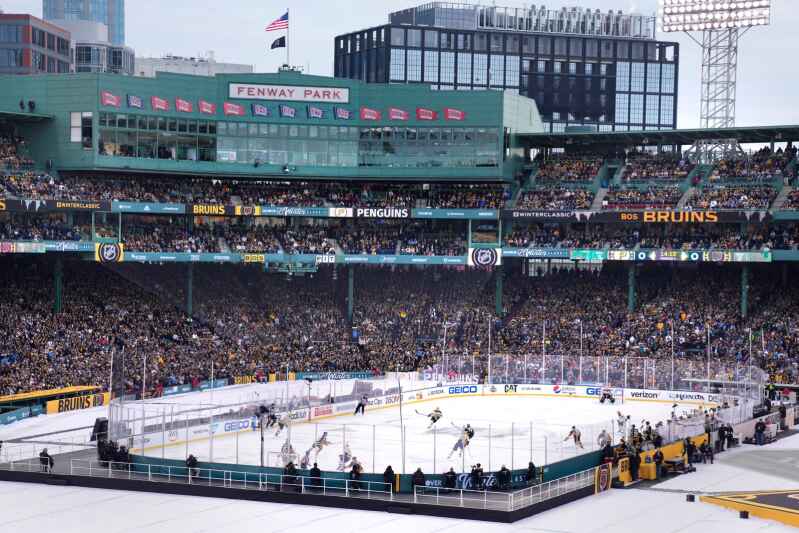 Bruins players wear vintage Red Sox uniforms before Winter Classic