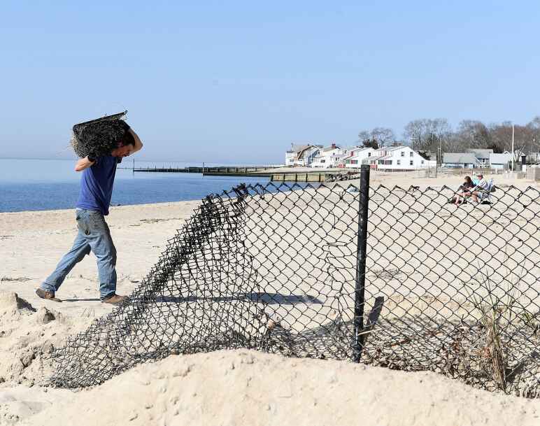 comes fence court Beach down after Miami ruling