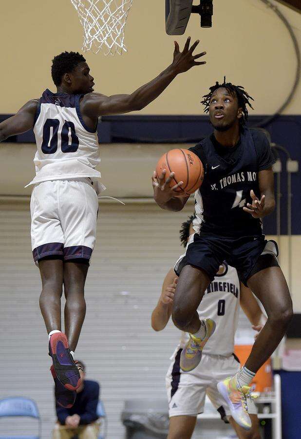 St. Thomas More boys' basketball wins round in National Prep