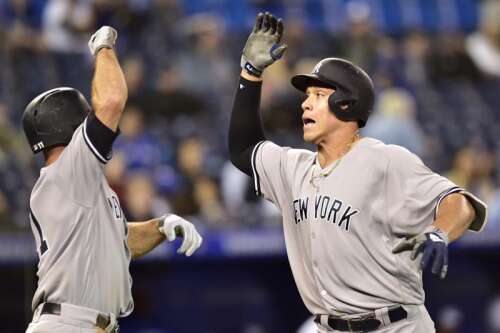 Chapman's homer helps Blue Jays snap Yankees' 11-game winning