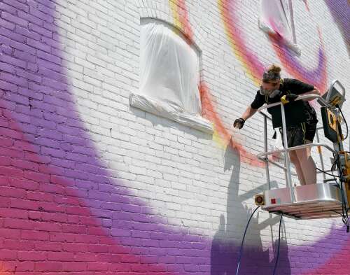 New mural brings message of light and hope to downtown Norwich