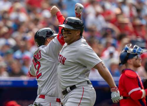 Rafael Devers hits two home runs, bullpen comes up clutch in Red