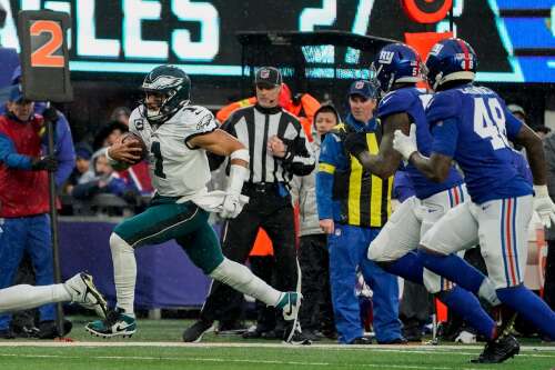 Hurts, Eagles secure playoff spot, thump rival Giants 48-22