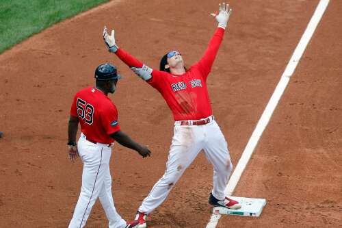 Carlos Febles needed a pinch hitter in third base coach's box