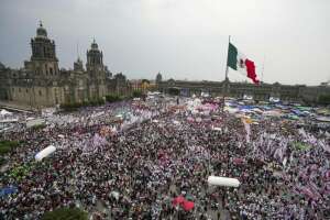 A violent, polarized Mexico goes to the polls to choose between 2 women presidential candidates