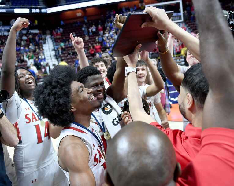 Saints pull away in second half to defeat Staples and win first state  basketball title since 1982